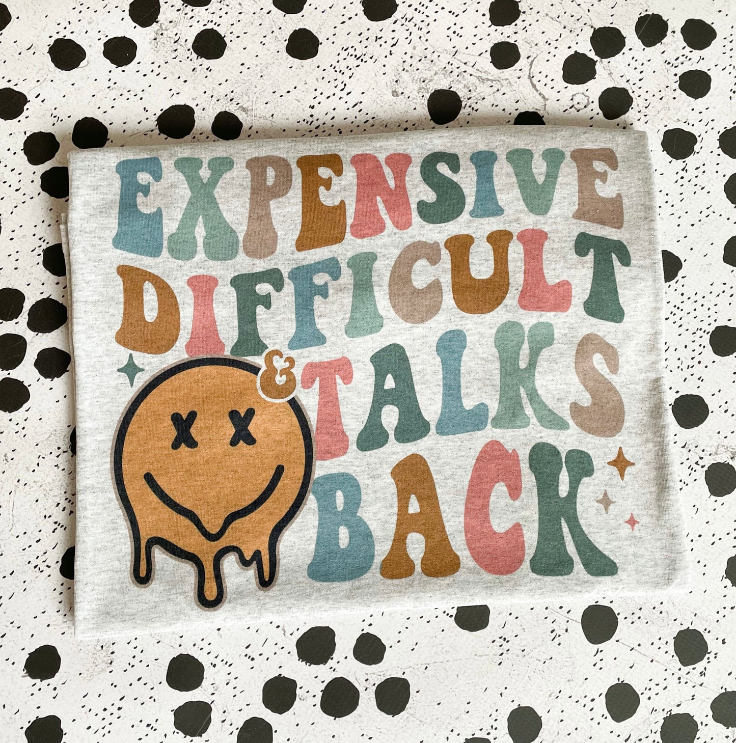 EXPENSIVE DIFFICULT & TALKS BACK